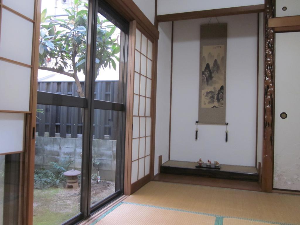 Enman Guest House Osaka Moriguchi Eksteriør billede