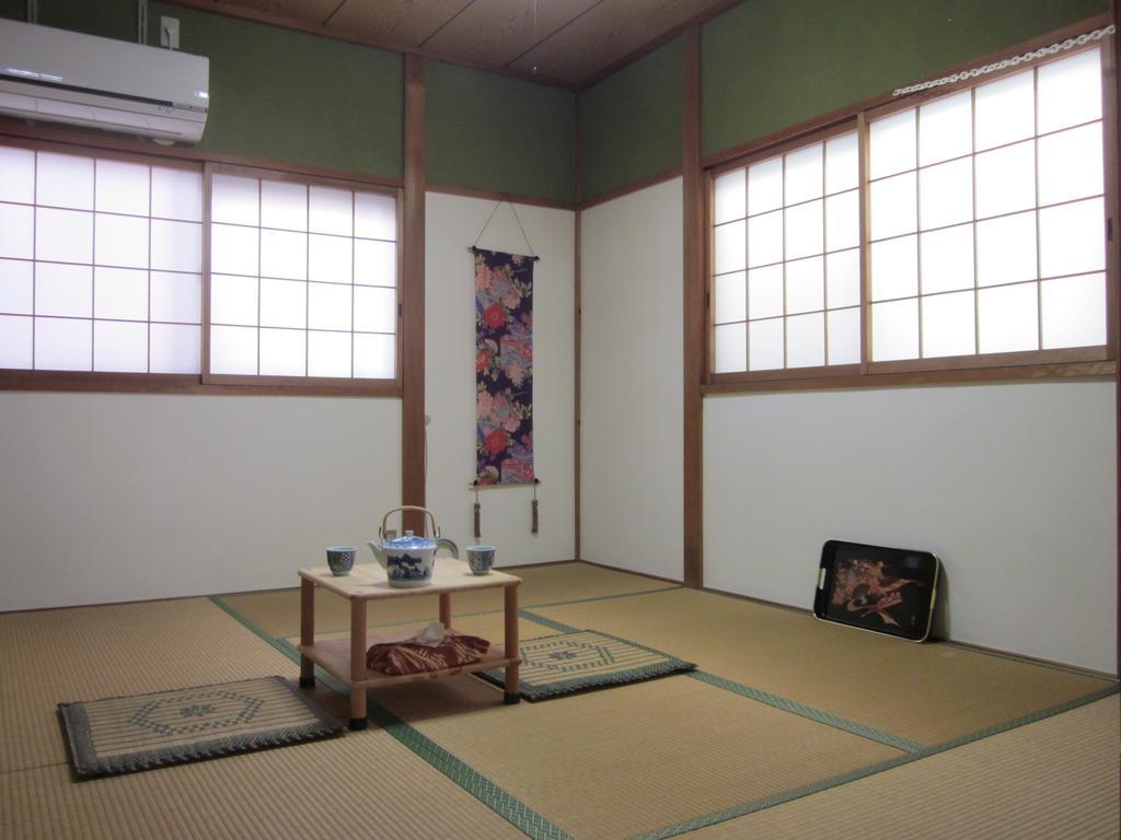 Enman Guest House Osaka Moriguchi Eksteriør billede